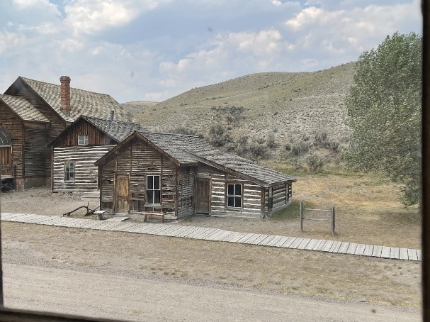 The photo shows a small mining town in southern Montana. Small religious societies such as this one often harbored polygamous marriages