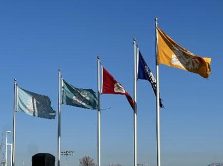 Flags flying outside the Olympic Oval, Kearns: